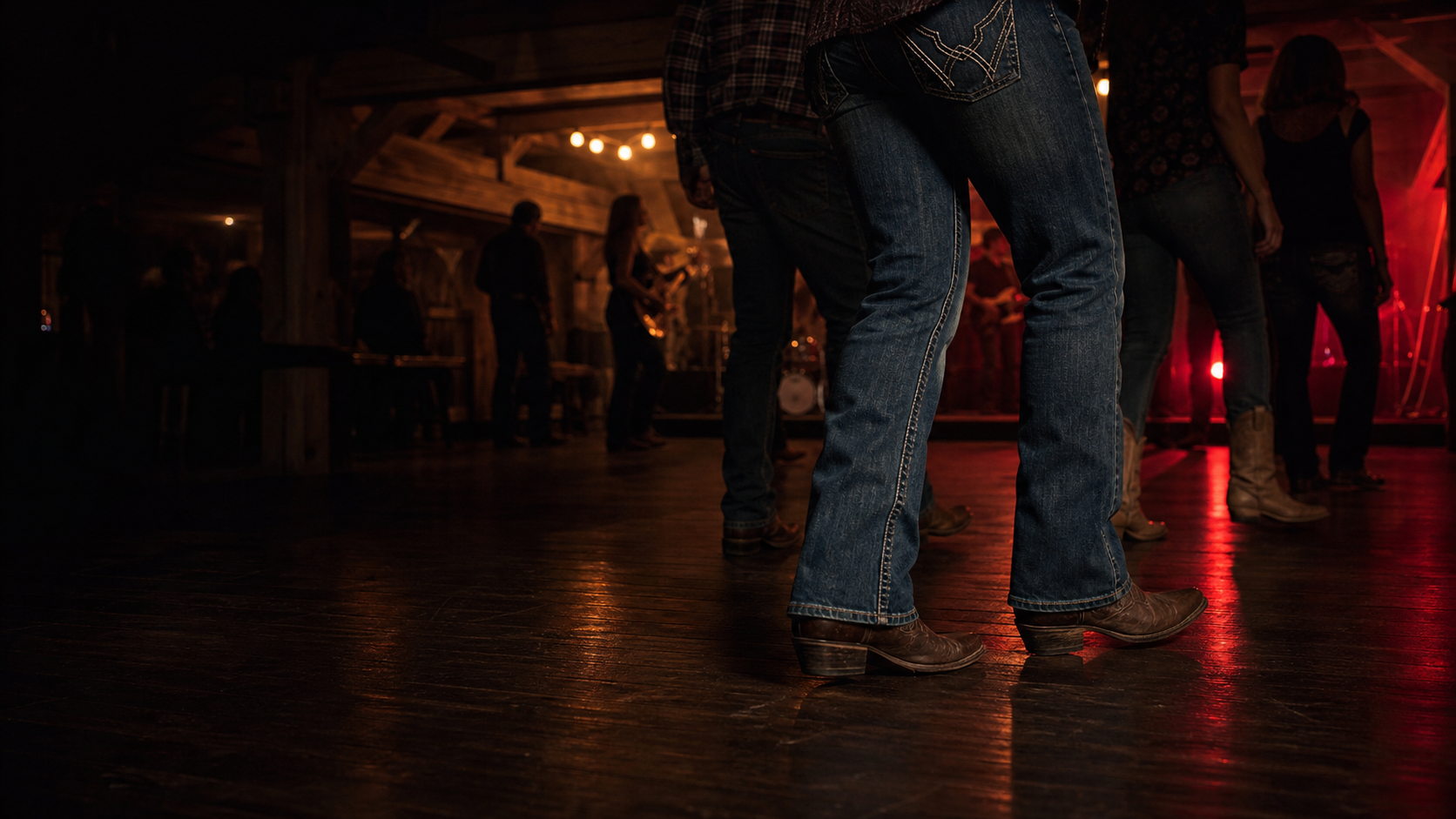 Line dancing boots on a dark saloon floor with live music lights